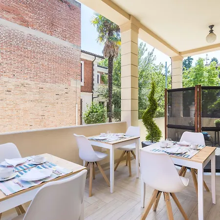 Alojamento de Acomodação e Pequeno-almoço Savioli & Breakfast 4*